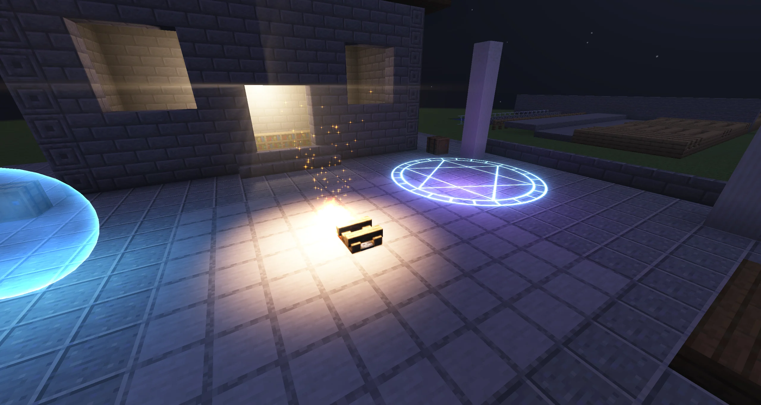 Embers rising from a campfire light a warm pool on the stone floor around it